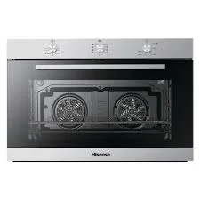 Stainless steel built-in oven with glass door and control knobs on top; two convection fans visible inside the oven cavity.